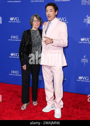 Palm Springs, United States. 04th Jan, 2024. PALM SPRINGS, RIVERSIDE COUNTY, CALIFORNIA, USA - JANUARY 04: Rosie Levin and Robert Downey Jr. arrive at the 35th Annual Palm Springs International Film Festival Film Awards held at the Palm Springs Convention Center on January 4, 2024 in Palm Springs, Riverside County, California, United States. (Photo by Xavier Collin/Image Press Agency) Credit: Image Press Agency/Alamy Live News Stock Photo