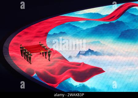 Beijing, China's Zhejiang Province. 23rd Sep, 2023. Flag bearers carry the Chinese national flag into the Hangzhou Olympic Sports Center Stadium during the opening ceremony of the 19th Asian Games in Hangzhou, east China's Zhejiang Province, Sept. 23, 2023. Credit: Yang Lei/Xinhua/Alamy Live News Stock Photo