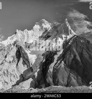 Pakistan, Northern Areas of the Karakoram Mountains. Pictorial image of Crystal and Marble Peaks from high on the Baltoro Glacier at Concordia a place known to mountaineers as the Throne Room of the Mountain Gods Stock Photo