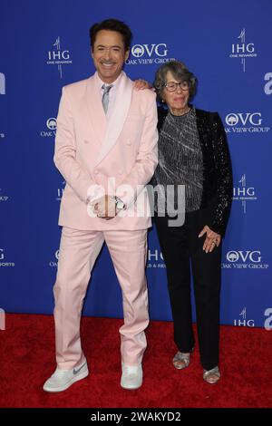 Robert Downey Jr. and Rosie Levin attends the 35th Annual Palm Springs International Film Awards at Palm Springs Convention Center on January 04, 2024 in Palm Springs, California. Photo: CraSH/imageSPACE Credit: Imagespace/Alamy Live News Stock Photo