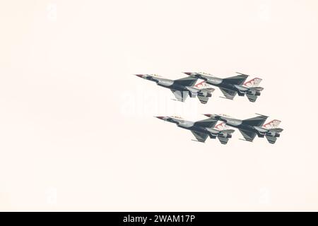 USAF Thunderbird demonstration flight team flying  F-16 Fighting Falcon jet fighters over Traverse City, Michigan, USA on July 1, 2023. Stock Photo