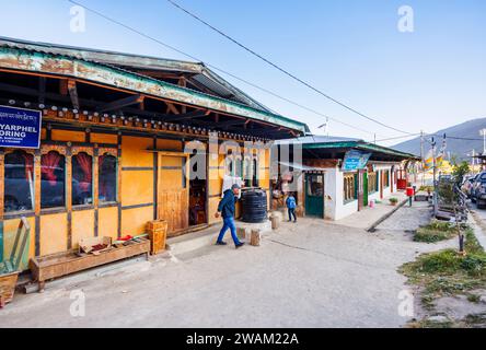 A row of typical local shops in Local shops in Chamkhar Town, Bumthang, in the central-eastern region of Bhutan Stock Photo
