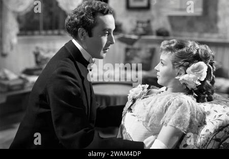 KIND HEARTS AND CORONETS 1949 GFD film with Dennis Price as swerial killer Louis Mazzini and Joan Greenwood as his childhood sweetheart Sibella Stock Photo