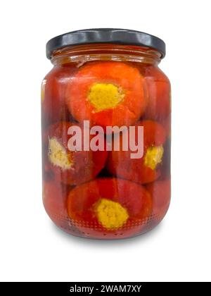 Small hot red peppers stuffed with soft cheese in oil in glass jar isolated on white with clipping path included Stock Photo