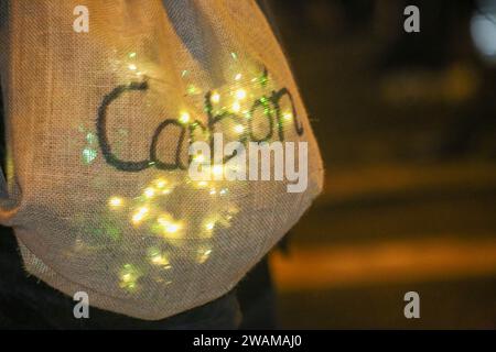 Aviles, Spain, January 05th, 2024: A bag full of charcoal for the children who have misbehaved this year during the HM Los Reyes Magos de Aviles Parade, on January 05, 2024, in Aviles, Spain. Credit: Alberto Brevers / Alamy Live News. Stock Photo