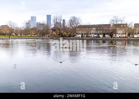 London, UK - December 20, 2023, view of the pond and skyscrapers of Canada Water Stock Photo