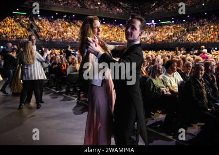 AMSTERDAM - The audience during a New Year's concert by violinist Andre Rieu in the Ziggo Dome. ANP RAMON VAN FLYMEN netherlands out - belgium out Stock Photo