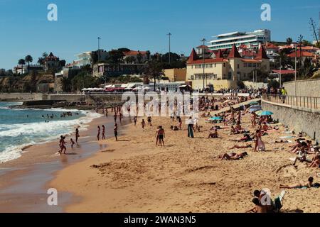 View of the Estoril waterfront, Poças beach and the yellow building of the popular education children's colony, in Estoril, Portugal, Europe Stock Photo