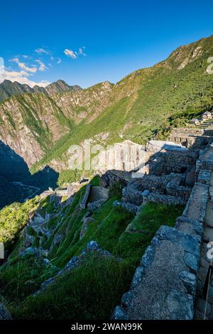 During Hiram Bingham expeditions in the early 1900s, he found Machu Picchu covered by a lot of the forest vegetation which needed to be removed. Unfor Stock Photo