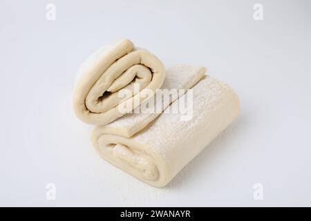 Raw puff pastry dough isolated on white Stock Photo - Alamy