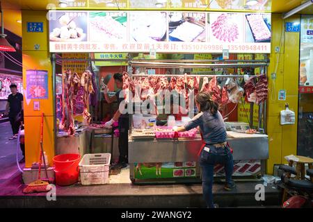 Shenzhen, China - November 20, 2019: butcher's stall with meat in Shenzhen. Stock Photo