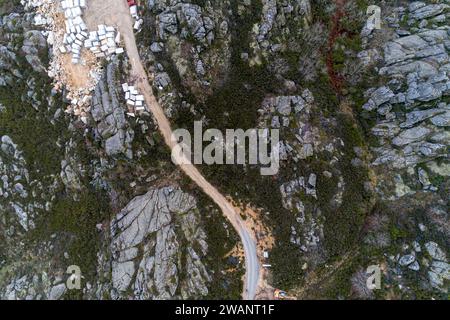 drone shot of an active granite quarry in Spain Stock Photo