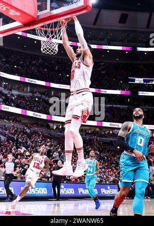 Chicago, USA. 5th Jan, 2024. Chicago Bulls guard Zach LaVine (top) dunks during the NBA regular season game between Chicago Bulls and Charlotte Hornets in Chicago, the United States, Jan. 5, 2024. Credit: Joel Lerner/Xinhua/Alamy Live News Stock Photo