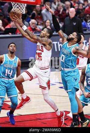 Chicago, USA. 5th Jan, 2024. Chicago Bulls forward Dalen Terry (2nd L) drives to the basket during the NBA regular season game between Chicago Bulls and Charlotte Hornets in Chicago, the United States, Jan. 5, 2024. Credit: Joel Lerner/Xinhua/Alamy Live News Stock Photo