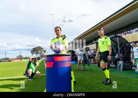 Bundoora, Australia. 6 January, 2024. Match Referee Beth Rattray takes the match ball prior to the start of the Isuzu UTE A-League match between Melbourne Victory FC and Western United FC at the Home of the Matildas in Bundoora, Australia. Credit: James Forrester/Alamy Live News Stock Photo
