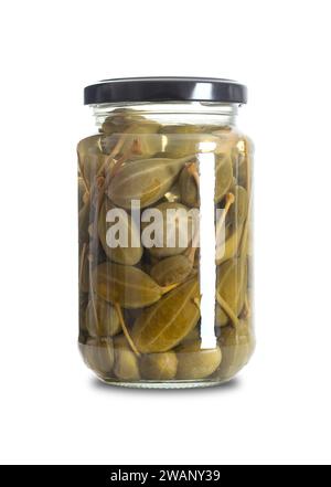Caper berries, pickled in a glass jar. Whole ripe caper bush fruits, Capparis spinosa, pasteurized and preserved in a brine of water, vinegar and salt. Stock Photo