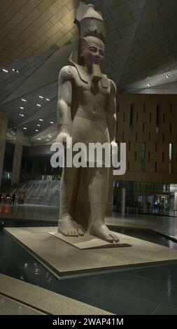 The Statue of Ramesses II in The Grand Egyptian Museum or Giza Museum, It is an archaeological museum in Giza, Egypt, about 2 kilometers from the Giza Stock Photo