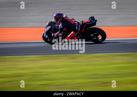 Spanish MotoGP rider Marc Marquez training for the first time on the Ducati of the Gresini Racing team at the Valencia circuit. Stock Photo