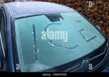 Kendal, Cumbria, January 6th 2024 - A clear night and sub-zero temperatures brought a cold morning frost to the town of Kendal in Cumbria overnight. Vehicles were seen with iced windscreens and the local Kendal Ski Slope had a frosty layer after the freezing conditions. Credit: Stop Press Media/Alamy Live News Stock Photo