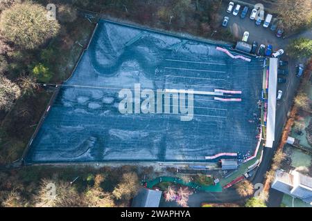 Kendal, Cumbria, January 6th 2024 - A clear night and sub-zero temperatures brought a cold morning frost to the town of Kendal in Cumbria overnight. Vehicles were seen with iced windscreens and the local Kendal Ski Slope had a frosty layer after the freezing conditions. Credit: Stop Press Media/Alamy Live News Stock Photo