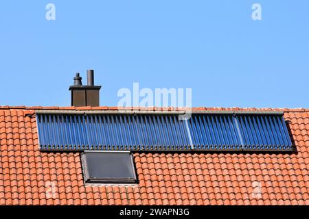 Solar thermal system on modern house roof to produce heating water ...