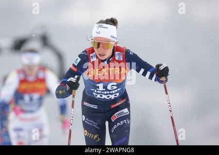 Lago Di Tesero, Italy. 06th Jan, 2024. © Pierre Teyssot/MAXPPP ; Cross Country Ski World Cup in Lago Di Tesero, Italy on January 6, 2024. At the stadium of the next Winter Olympic Games Milano Cortina 2026, in action, during the Mass Start Classic Race of the Tour de ski, Delphine Claudel (FRA) © Pierre Teyssot/Maxppp Credit: MAXPPP/Alamy Live News Stock Photo