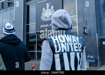 Newcastle upon Tyne, UK. 6th January 2024. Newcastle United fans queue at St James' Park, to get on busses to take them to the away match in Sunderland, in the Wear-Tyne derby FA Cup 3rd Round. Credit: Hazel Plater/Alamy Live News Stock Photo