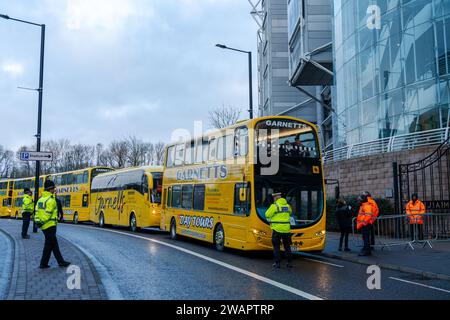 Newcastle upon Tyne, UK. 6th January 2024. Newcastle United fans on the bus to take them to the away match in Sunderland, in the Wear-Tyne derby FA Cup 3rd Round. Credit: Hazel Plater/Alamy Live News Stock Photo