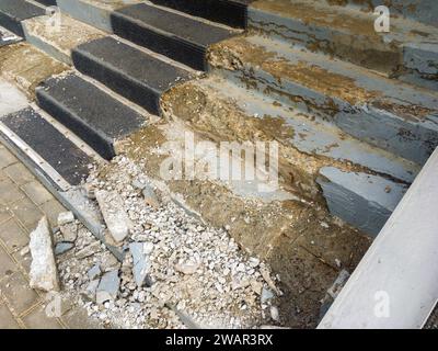 Crumbling steps of a concrete staircase Stock Photo