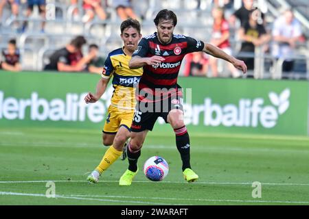 Parramatta, Australia. 06th Jan, 2024. Joshua Jeffery Nisbet (L) of the Central Coast Mariners and Joshua Brillante (R) of the Western Sydney Wanderers FC seen in action during the 2023-24 A-League Men's season round 11 match between Western Sydney Wanderers FC and Central Coast Mariners at CommBank Stadium. Final score; Central Coast Mariners 1: 0 Western Sydney Wanderers. Credit: SOPA Images Limited/Alamy Live News Stock Photo