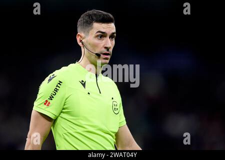 MADRID, SPAIN - JANUARY 03: Referee Alejandro Muniz Ruiz  during the LaLiga EA Sports match between Real Madrid CF and RCD Mallorca at Estadio Santiago Bernabeu on January 03, 2024 in Madrid, Spain. (Photo by QSP) Stock Photo