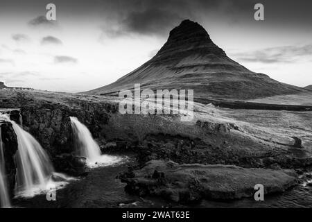 Spectacular view of the waterfall in front of Kirkjufell in black and white, Iceland Stock Photo