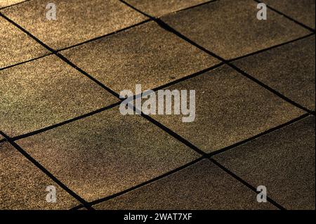 rubber soft covering with squares on the playground 3 Stock Photo