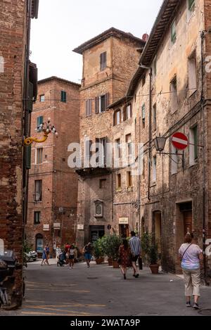 Somewhere in the streets of the old medieval Siena, Italy Stock Photo