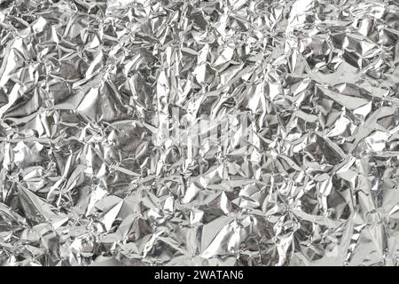 Shiny background made of crumpled chocolate foil Stock Photo