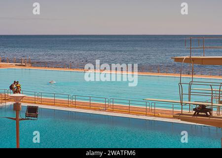 Summer evening at the public swimming pools at Sea point, Cape Town, South Africa Stock Photo