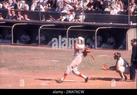 LOS ANGELES, CA - JULY 9:  Frank Robinson #20 of the Cincinnati Reds swings at the pitch as catcher John Roseboro #8 of the Los Angeles Dodgers and umpire Dusty Boggess look on during an MLB game on July 9, 1961 at the Los Angeles Memorial Coliseum in Los Angeles, California.  (Photo by Hy Peskin) *** Local Caption *** Frank Robinson;John Roseboro;Dusty Boggess Stock Photo