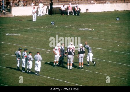 DALLAS, TX - SEPTEMBER 21:  General view of the coin toss before the #2 ranked Texas A&M Aggies play the Maryland Terrapins on September 21, 1957 at the Cotton Bowl in Dallas, Texas.  The Aggies defetead the Terrapins 21-13.  (Photo by Hy Peskin) Stock Photo