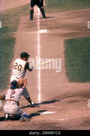 PITTSBURGH, PA - JUNE 26:  Gino Cimoli #20 of the Pittsburgh Pirates swings at the pitch during an MLB game against the Chicago Cubs on June 26, 1960 at Forbes Field in Pittsburgh, Pennsylvania.  (Photo by Hy Peskin) *** Local Caption *** Gino Cimoli Stock Photo