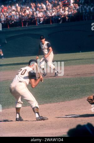 PITTSBURGH, PA - JUNE 26:  Gino Cimoli #20 of the Pittsburgh Pirates takes the pitch during an MLB game against the Chicago Cubs on June 26, 1960 at Forbes Field in Pittsburgh, Pennsylvania.  (Photo by Hy Peskin) *** Local Caption *** Gino Cimoli Stock Photo