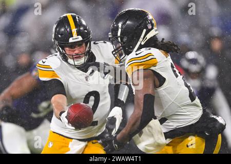 Pittsburgh Steelers quarterback Mason Rudolph (2) hands off to running back Najee Harris (22) during a game against the Baltimore Ravens at M&T Bank Stadium in Baltimore, Maryland, on Saturday, January 6, 2024. Photo by David Tulis/UPI Stock Photo