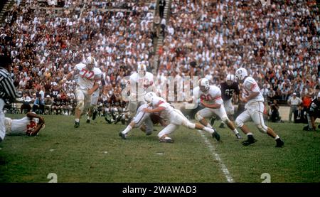 DALLAS, TX - SEPTEMBER 21: General view as #28 of the Texas A&M Aggies gets tackled by #53 of the Maryland Terrapins during an NCAA game on September 21, 1957 at the Cotton Bowl in Dallas, Texas.  The Aggies defetead the Terrapins 21-13.  (Photo by Hy Peskin) Stock Photo