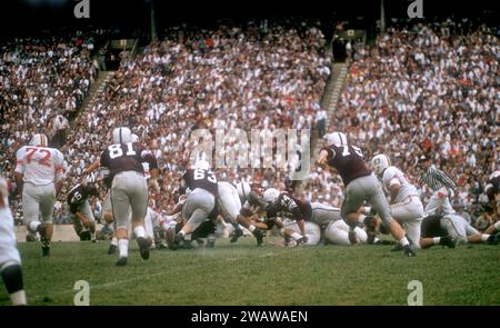 DALLAS, TX - SEPTEMBER 21: General view as players from the Maryland Terrapins and Texas A&M Aggies pile up during an NCAA game on September 21, 1957 at the Cotton Bowl in Dallas, Texas.  The Aggies defetead the Terrapins 21-13.  (Photo by Hy Peskin) Stock Photo