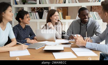 Happy multiethnic students have fun studying indoors together Stock Photo