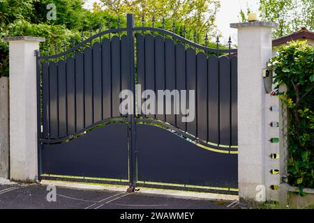 black steel gate high house portal of old traditional french european house Stock Photo