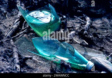 Dangerous sharp glass from a broken bottle Stock Photo