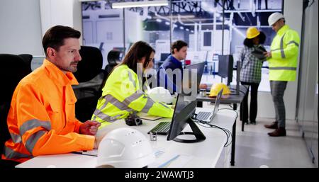 Engineer Operators Using Scada System At Industrial Plant Stock Photo