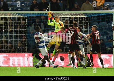 London, UK. 07th Jan, 2024. Bournemouth Goalkeeper Mark Travers catches a corner under pressure from QPR Goalkeeper Asmir Begović during the FA Cup match between Queens Park Rangers and Bournemouth at The Loftus Road Stadium, London, England on 6 January 2024. Photo by Ken Sparks. Editorial use only, license required for commercial use. No use in betting, games or a single club/league/player publications. Credit: UK Sports Pics Ltd/Alamy Live News Stock Photo