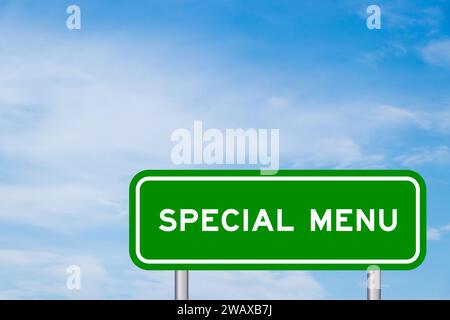 Green color transportation sign with word special menu on blue sky with white cloud background Stock Photo