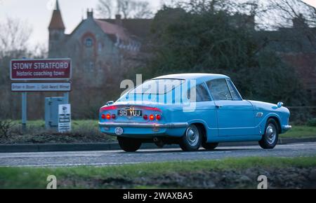 Stony Stratford,UK Jan 1st 2024. 1962 blue Bond Equipe car arriving at Stony Stratford for the annual New Years Day vintage and classic vehicle festiv Stock Photo